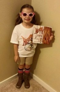 Barbara's granddaughter, a big fan of Little Miss History, dresses up as her favorite character.